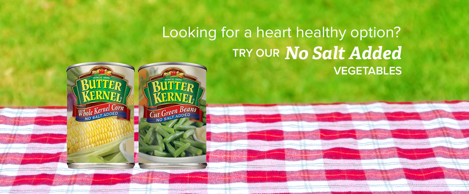 "Looking for a heart healthy option? Try our no salt added vegetables" Two cans of food on a picnic table